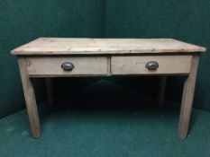 A pine refectory kitchen table and two benches