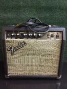 A Fender Frontman 15G guitar amplifier