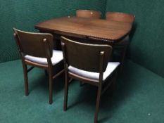 A six piece walnut dining room suite