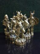 A set of heavy brass figural paperweights