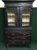 A late nineteenth century pine kitchen cabinet fitted with four drawers beneath