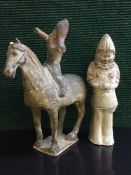 A Chinese stoneware horse and rider group, Tang period, on 19th century ebonised wood plinth,