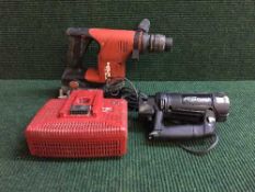 A Hilti TE 6-A gun with charger and a Rotozip