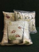 Three French Artes De Lys cushions depicting gold fish in vases