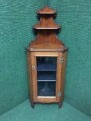 A Victorian mahogany glazed door corner cabinet