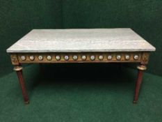 A mahogany and gilt French style marble topped coffee table