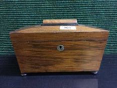 A Victorian mahogany tea caddy