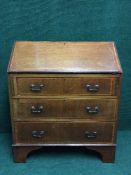 An Edwardian inlaid mahogany bureau