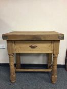 A reclaimed pine butcher's block fitted a drawer