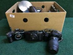 Box of assorted cameras and accessories including Kodak, Nikon,