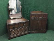 A three piece Chapmans Siesta oak bedroom suite : single door wardrobe,