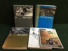 Two Harley Davidson service manuals together with a diagnostic manual and three other booklets