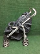 A Silver Cross push chair