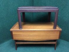 A stained teak G Plan coffee table and a teak flap sided coffee table