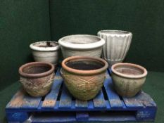 Six assorted circular garden planters