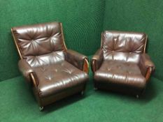 A mid twentieth century three piece G-Plan Saddle Suite comprising of three seater settee and two