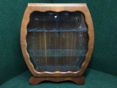 A 1930's walnut Art Deco style display cabinet