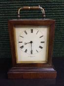 A French striking brass carriage clock, twin barrel movement with platform escapement,