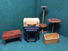 A nest of three oak tables, shoe shine box, two plant stands,