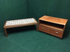 A mid 20th century teak G Plan audio stand and a tiled topped coffee table