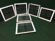 Six framed stained glass windows