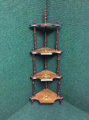 A Victorian inlaid rosewood corner whatnot stand