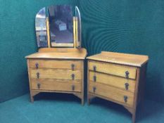 A three piece oak bedroom suite : mirror door wardrobe,