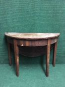 A Victorian inlaid mahogany d-shaped flap sided table