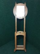 An oak mirrored hall stand
