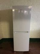 A Beko upright fridge freezer