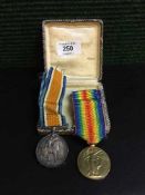 Two WWl medals with suspension ribbons