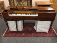 A 19th century inlaid mahogany table piano