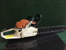 A gasoline chain saw model Mt-9999
