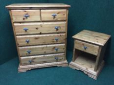 A contemporary pine six drawer chest and a matching bedside stand