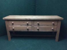 A pine farmhouse four drawer sideboard