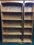 Two sets of pine open shelves