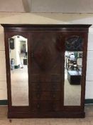 A Victorian inlaid mahogany compactum wardrobe