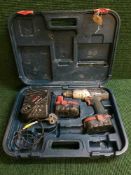 A Bosch JSB 24 VE-2 Professional drill with battery and charger in case