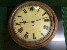 An early twentieth century mahogany school clock