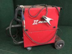 A Nexus NXN325 mig welder