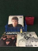 A basket of lps and 45's including Beatles John Lennon,