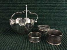 Two silver napkin rings,