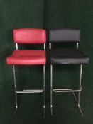 A pair of contemporary bar chairs on chrome legs (black and red)