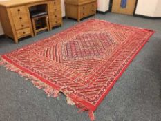 A fringed Turkish carpet with geometric design