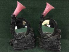 A pair of contemporary Art Deco style mirrors with light fitting