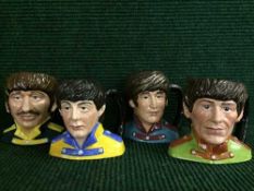 Four Royal Doulton character jugs -The Beatles, George Harrison D6727, RIngo Starr D6726,