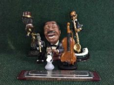 A tray of figurines, jazz musicians,
