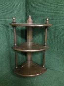 An Ercol three tier corner what not stand