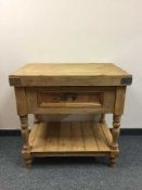 A reclaimed pine butcher's block fitted with a drawer