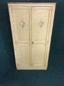 A painted double door wardrobe